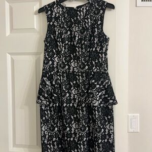 Black and white sleeveless lace peplum style dress. Shoshanna size 8.